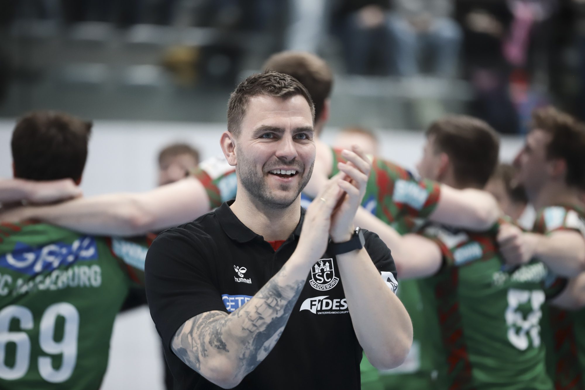 Christoph Theuerkauf Trainer lachend